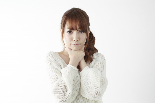 辛そうな女性